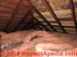 Fire damage and repairs in building attic (C) Inspectapedia.com Dovber Kahn