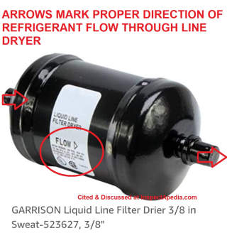 Refrigerant line dryers shoudl be installed facing in the proper direction: flow of refrigerant is marked by arrows on the canister (C) InspectApedia.com