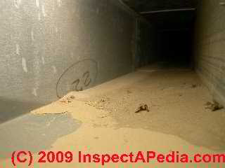 Mud in a building air duct after building flooding (C) Daniel Friedman