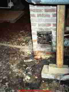 Photograph of a chimney cleanout door (missing)
