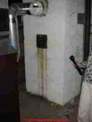 Water leak stains at the chimney cleanout door (C) Daniel Friedman
