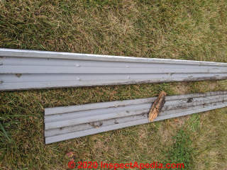 Extreme rot in band joist of a 5 year old deck due to improper construction details (C) InspectApedia.com M.H. 