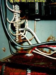Rust on steel electrical panel components (C) Daniel Friedman