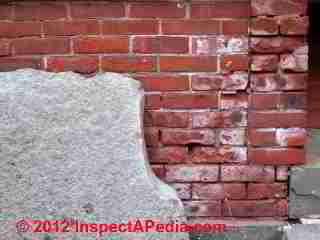 Brick effloresence & mortar loss & spalling © D Friedman at InspectApedia.com 