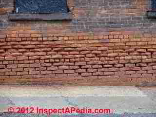 Spalling bricks © D Friedman at InspectApedia.com 