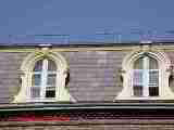 Hood mold curved top windows (C) Carson Dunlop Associates