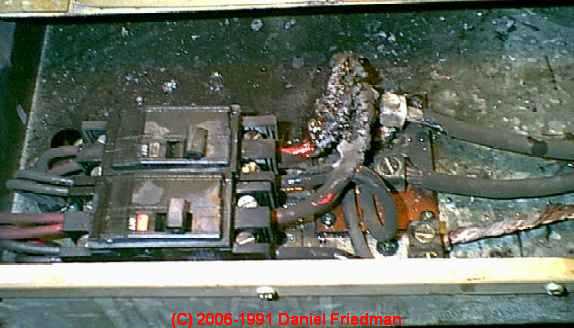 Photograph of Heater circuit burnup, FPE breaker failed to trip