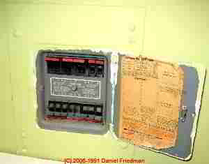 Photograph of a typical Federal Pacific Electric Stab-Lok® electric panel cover and door label