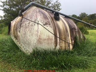 Old fiberglass silo in Queensland, Australia, could have been coated with an asbestos-containing paint (C) InspectApedia.com  Miles