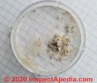 Spray on fireproofing insulation test sample from NYC (C) Daniel Friedman at InspectApedia.com