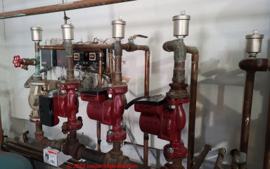 Air bleeder valves on heating system in Two Harbors MN home (C) InspectApedia.com djf