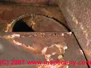 Photograph of furnace rust damage.