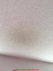 Dark stains on ceilings or walls over scented candles (C) InspectApedia.com SchwartZ M