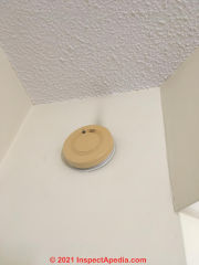 Dark stains above smoke detector - thermal tracking? (C) InspectApedia.com SchwartzM