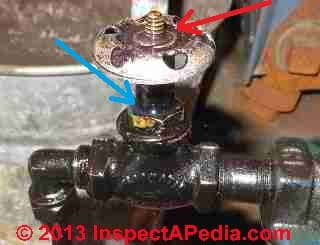Heating oil leak at oil safety valve (C) Daniel Friedman
