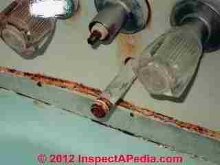 Improper and non-functional tub controls and spout in a mobile home (C) Daniel Friedman