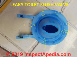 Deformed leaky toilet flush valve (C) Daniel Friedman at InspectApedia.com