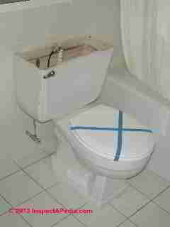 Toilet tank crack leak © D Friedman at InspectApedia.com 