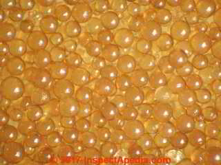 Water softener resin beads - up close (C) Daniel Friedman at InspectApedia.com