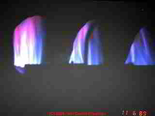 Photograph of  this gas flame which gives a clue that there may be an operating problem and an unsafe gas furnace in this building