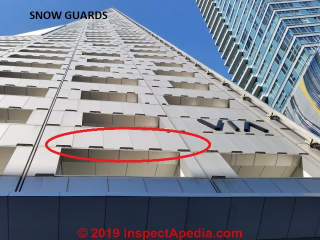 Snow Guards on a New York City building (C) InspectApedia.com Daniel Friedman