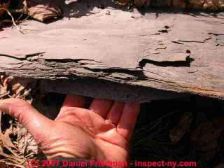 Photograph of soft roofing slates that are worn out