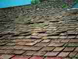 Photograph of a fragile wood shingle roof - stay off.