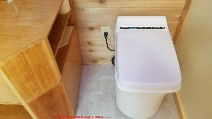 CINDERELLA Comfort incinerating toilet installed (C) InspectApedia.com 