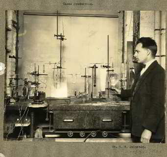 Ozone generation demonstration at the Fixed Nitrogen Research Lab, 1926 showing E.H. Johnston - Wikipedia commons en.wikipedia.org ret 2017 08 19 AT InspectApedia.com  