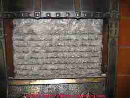 Photograph of a pre-1900 gas fireplace containing asbestos