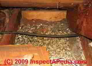 Vermiculite insulation in this attic ceiling may contain asbestos fibers.
