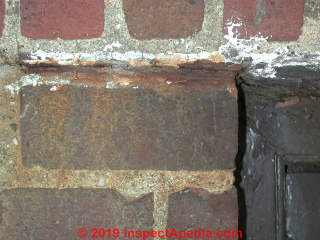 Exfoliating rust steel lintel damages brick wall (C) Daniel Friedman at InspectApedia.com