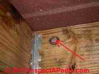 Deck ledger connection using lag bolts © D Friedman at InspectApedia.com 