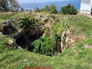 Sinknhole in Terranova, Quebradillas, Puerto Rico in early 2023 (C) Daniel Friedman at InspectApedia.com