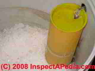 Photo of water softener salt tank and salt