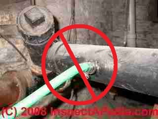 Cross connection between a water softener drain line and a sewer line (C) InspectApedia