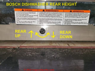 Set the rear  height of the Bosch dishwasher with this adjusting screw at the center of its lower front frame (C) Daniel Friedman at InspectApedia.com