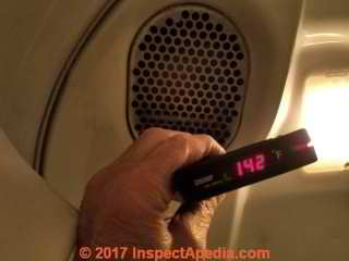 Measuring temperature at the hot air inlet of a Maytag LP gas clothes dryer (C) Daniel Friedman