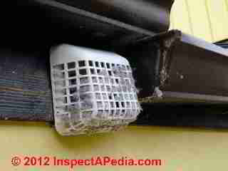 Clogged dryer vent fan cover © D Friedman at InspectApedia.com 