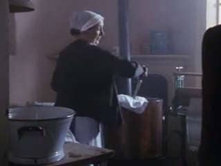 Antique hand-operated clothes washer from a Poirot mystery movie - at InspectApedia.com