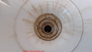 Oil stains in washing machine Frigidaire Model GLET1401AS1 (C) InspectApedia.com Joanna