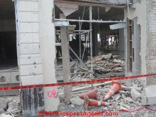 Debris from earthquake damaged building demolition Christchurch NZ 2014 © Daniel Friedman at InspectApedia.com