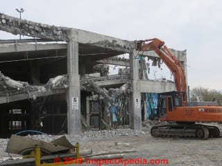 Demolition of an earthquake-damaged parking garage, Christchurch NZ 2014 (C) Daniel Friedman at InspectApedia.com