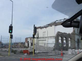 Empty lots and partially-demolished buildings in Christchurch in 2014 © Daniel Friedman at InspectApedia.com