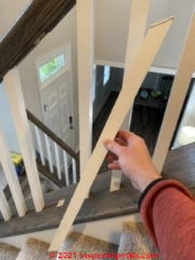Easily-pulled-off stair guard balusters are unsafe (C) InspectApedia.com Greg