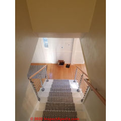Continuous handrailing on one side of stairs not both (C) InspectApedia.com Emster