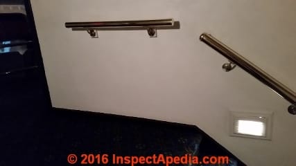 Stairway handrail stops at landing (C) InspectApedia.com