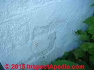 Spalling concrete foundation wall - masoanry block damage (C) InspectAPedia Arlene Puentes