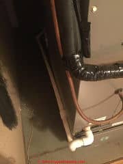 AC Condensate drain spillage (C) InspectApedia.com Kari