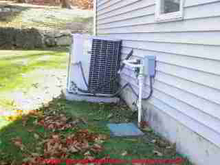 Photograph of air conditioning compressor condenser units with many problems (C) Daniel Friedman